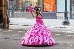 Latina celebrating her Quinceañera, coming-of-age celebration