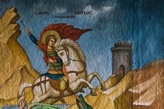 St. George drives magnificent reptile to extinction, church painting in Psarades  